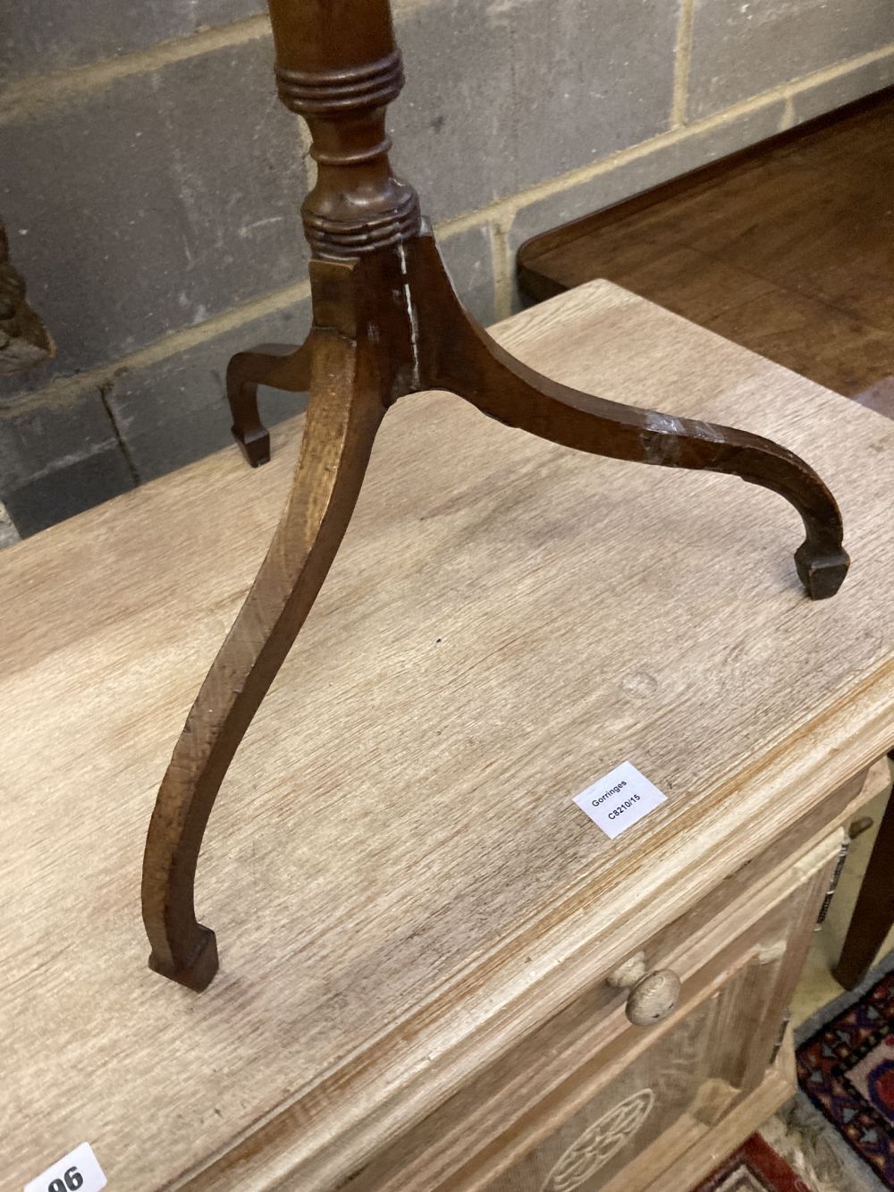 A Regency mahogany tripod wine table, width 44cm depth 34cm height 70cm